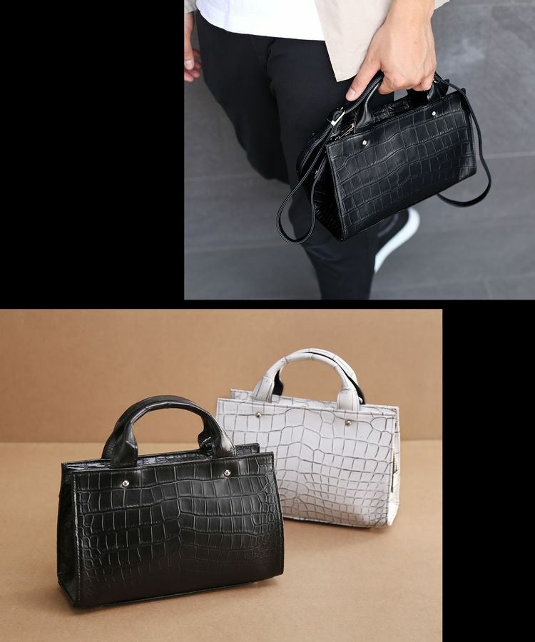 ショルダーベルト付きの鰐革鞄