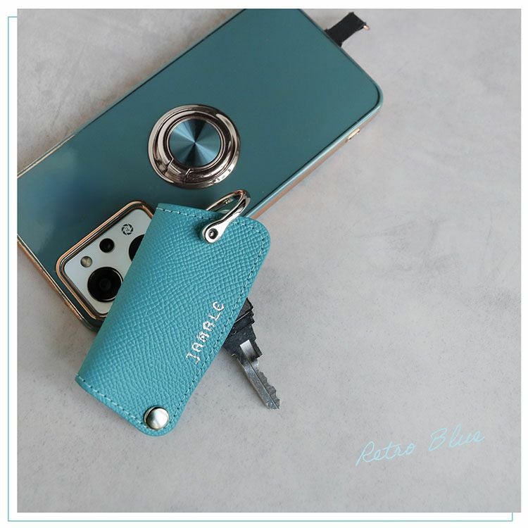 落ち着いたトーンのレトロブルーレザーキーケース