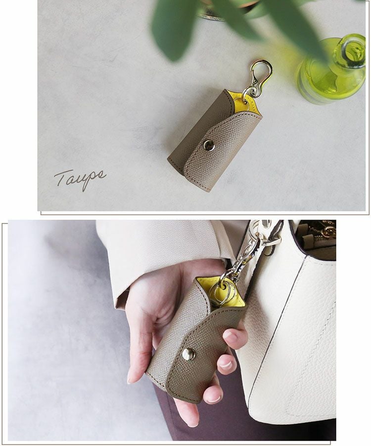 明るいイエローのバランスがおしゃれなトープカラーのスマートキーケース